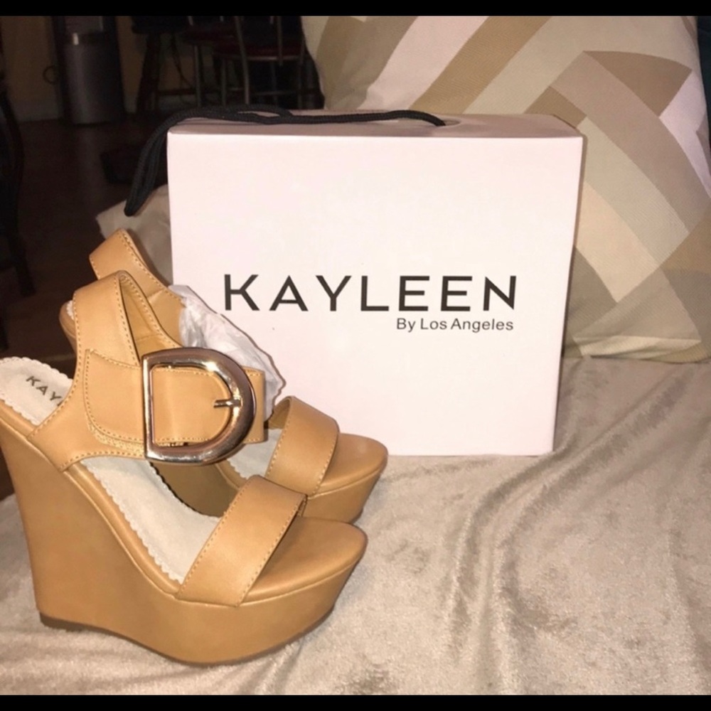 Kayleen wedged heels! Bought and worn once for special occasion. Negotiable!!